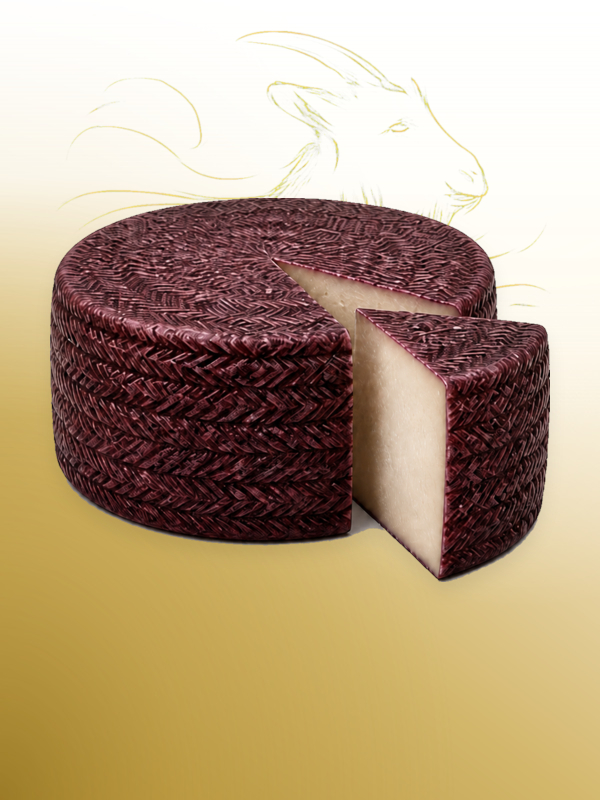 Queso manchego de cabra ba&ntilde;ado en vino tinto Salvatore
